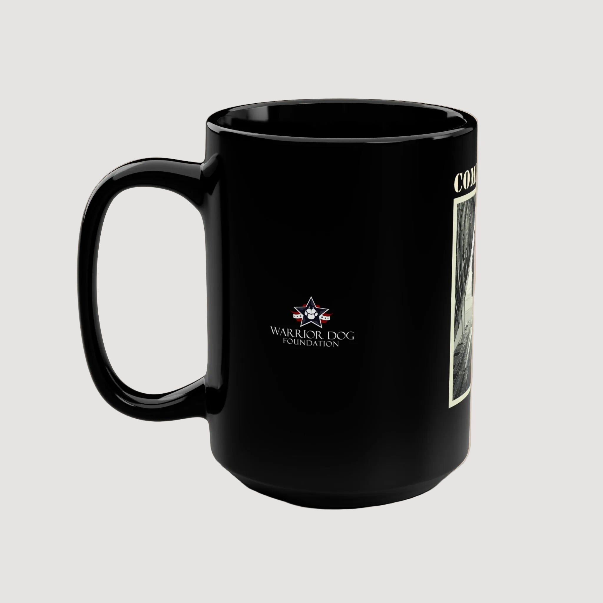 Black mug with Warrior Dog Foundation logo on a beige background