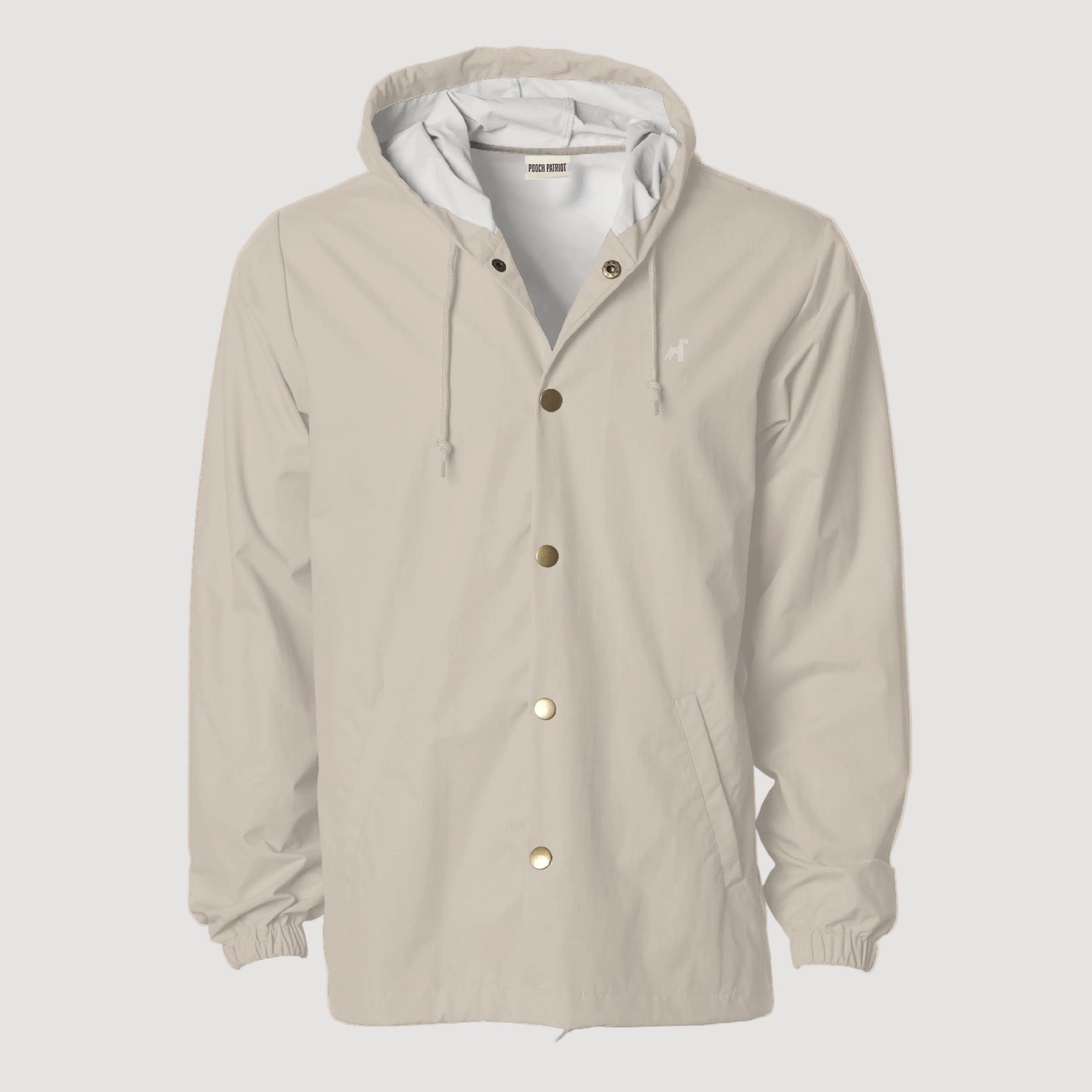 Beige hooded jacket with buttons on a beige background
