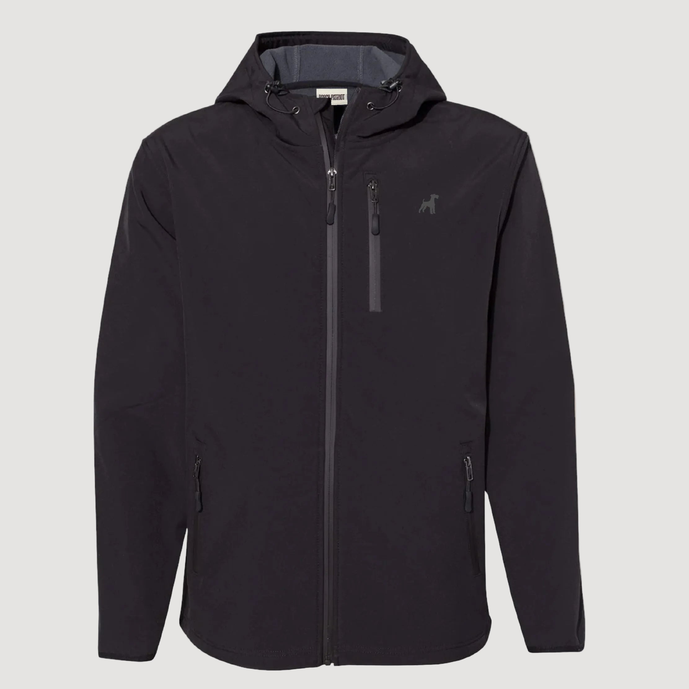 Black jacket with a brand logo on a beige background