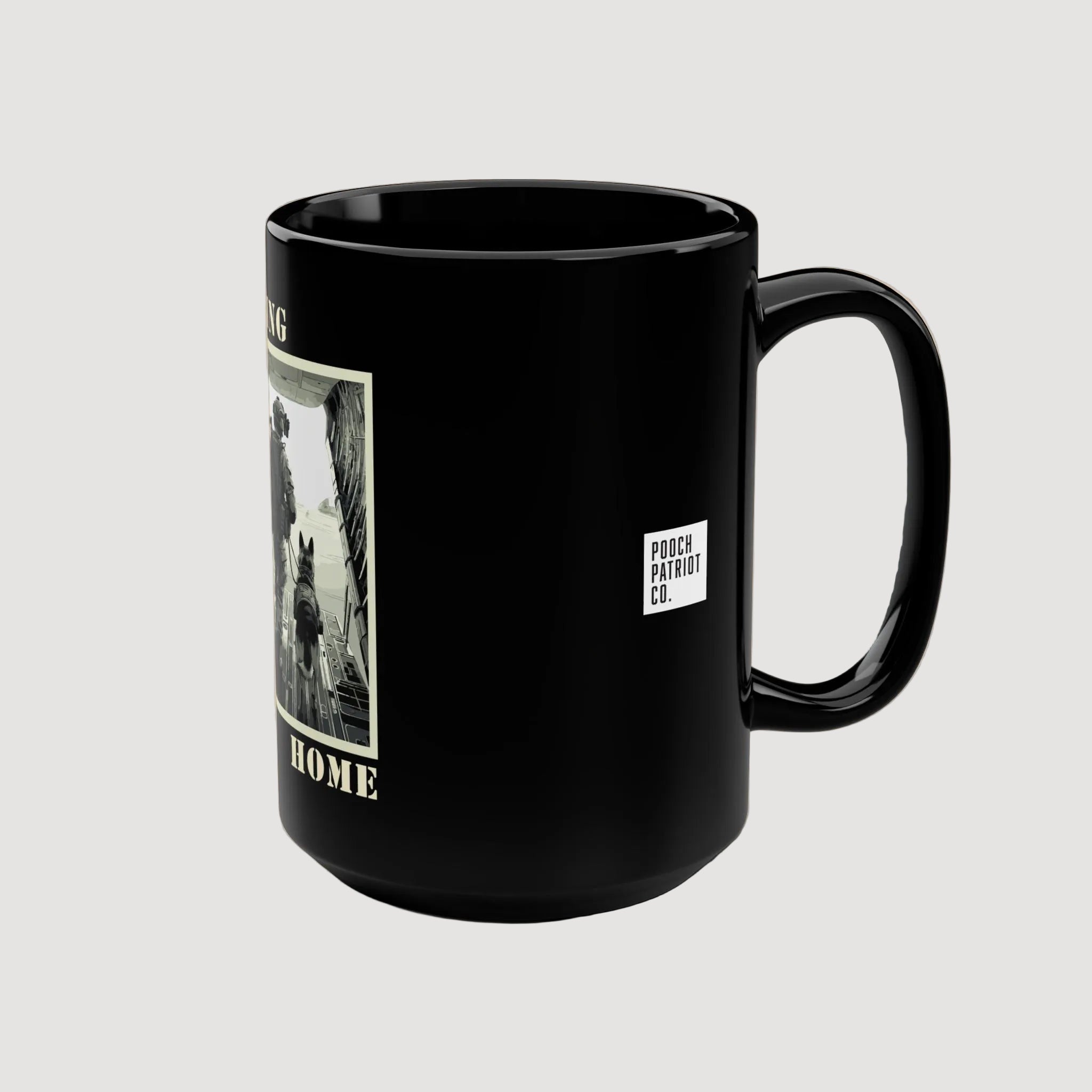 Black mug with a graphic and logo on a beige background