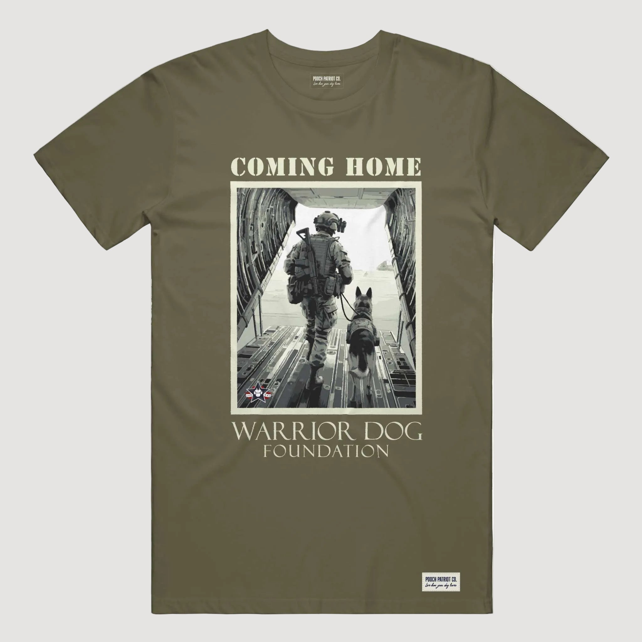 Olive green t-shirt with a graphic of a soldier and dog and text 'Coming Home' and 'Warrior Dog Foundation'.