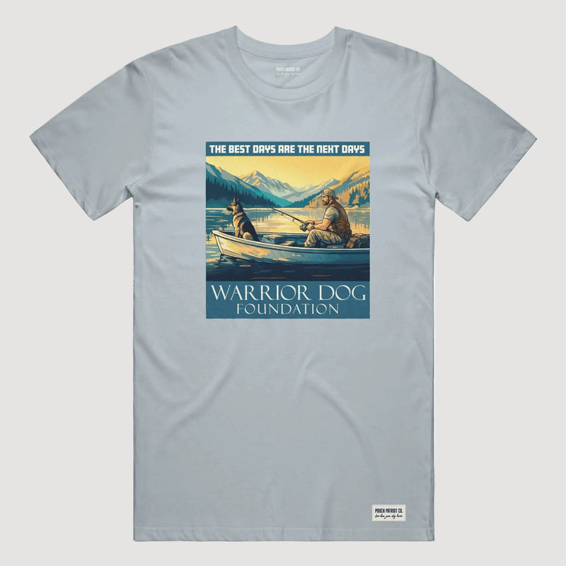 Gray t-shirt with a graphic of two people in a boat and mountains, featuring 'Warrior Dog Foundation' text.