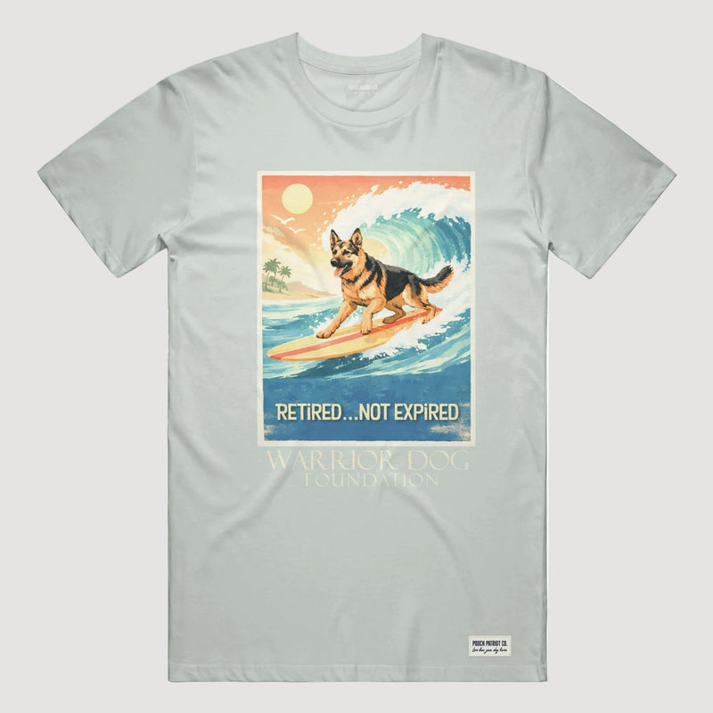Light gray t-shirt with a graphic of a dog on a surfboard and text 'Retired... Not Expired' on a white background.