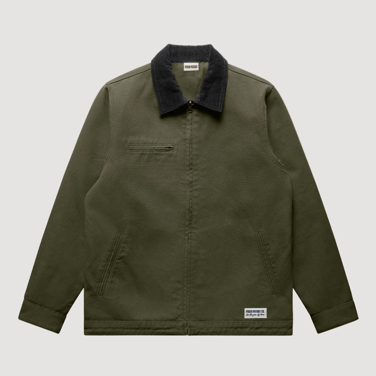 Green jacket with black collar on a beige background