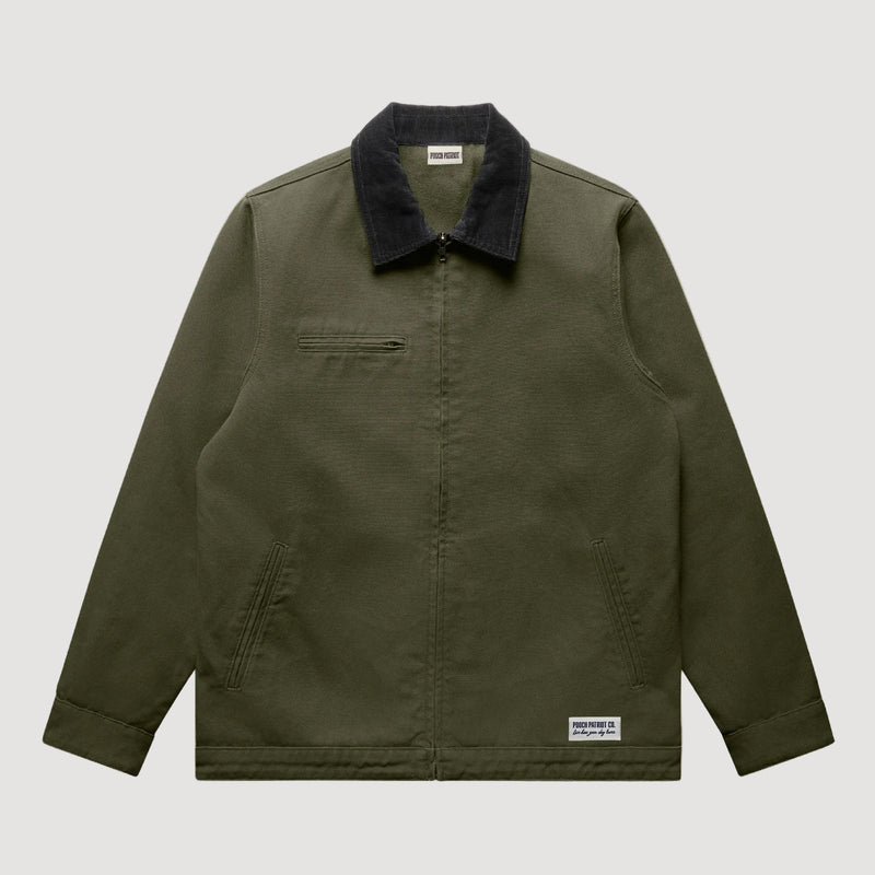 Green jacket with black collar on a beige background