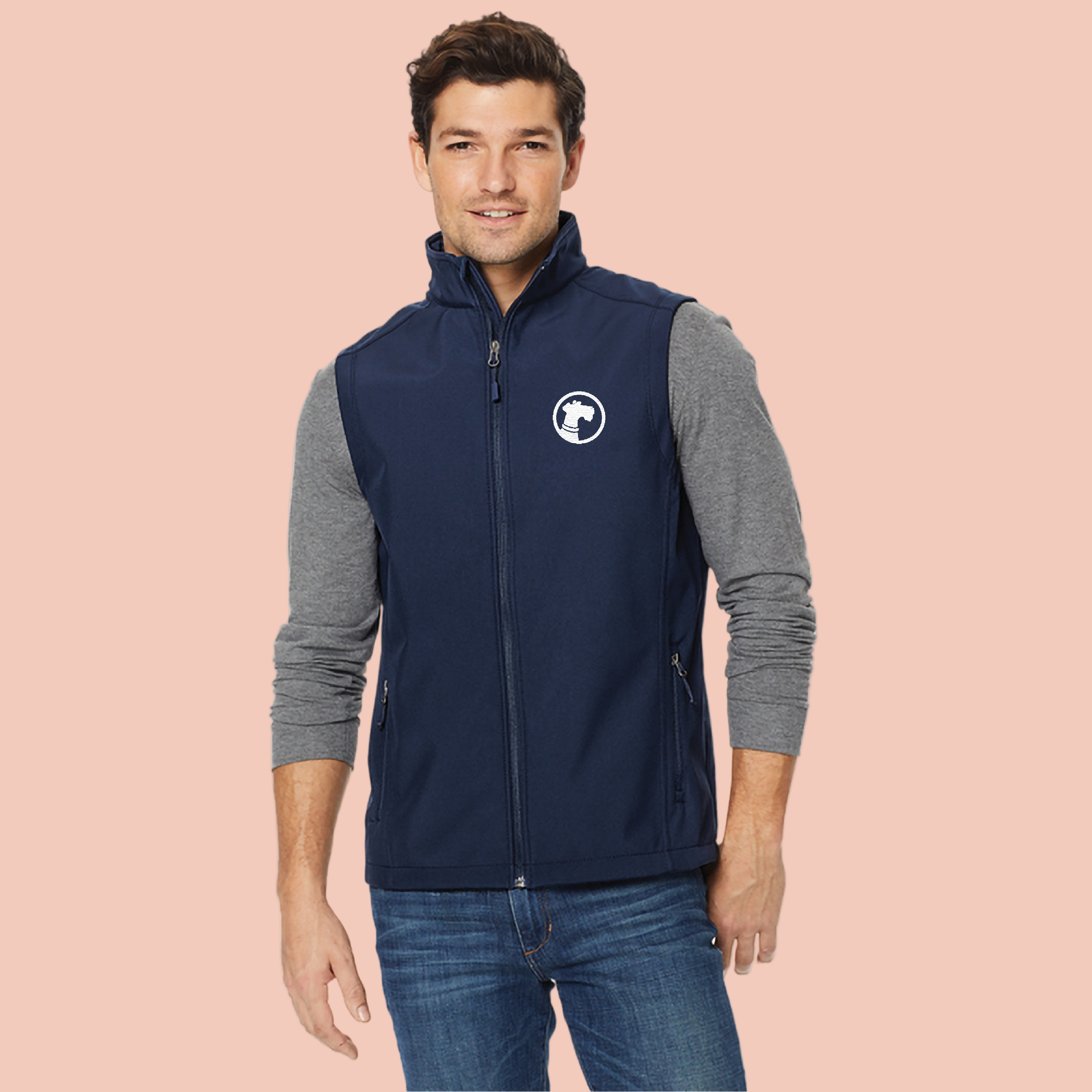 Man wearing a navy and gray vest with a logo on a white background