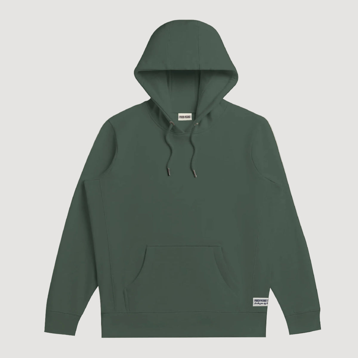 Green hoodie on a beige background