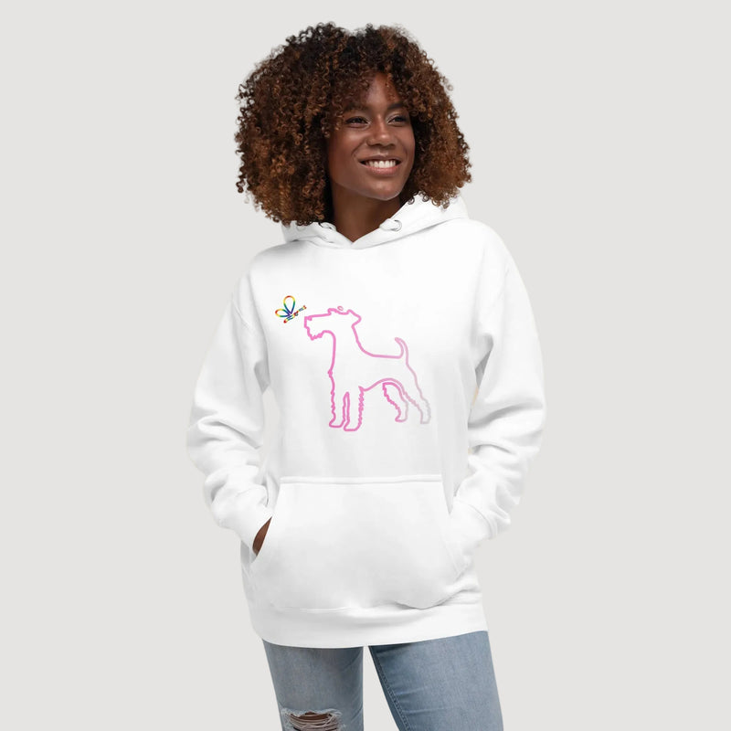 Person wearing a white hoodie with a pink dog design on a beige background