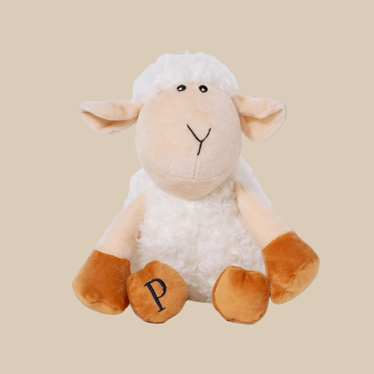 Plush toy sheep with a white fleece and brown feet on a white background